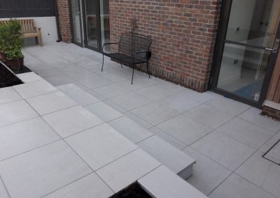 new patio and steps at the back of the house